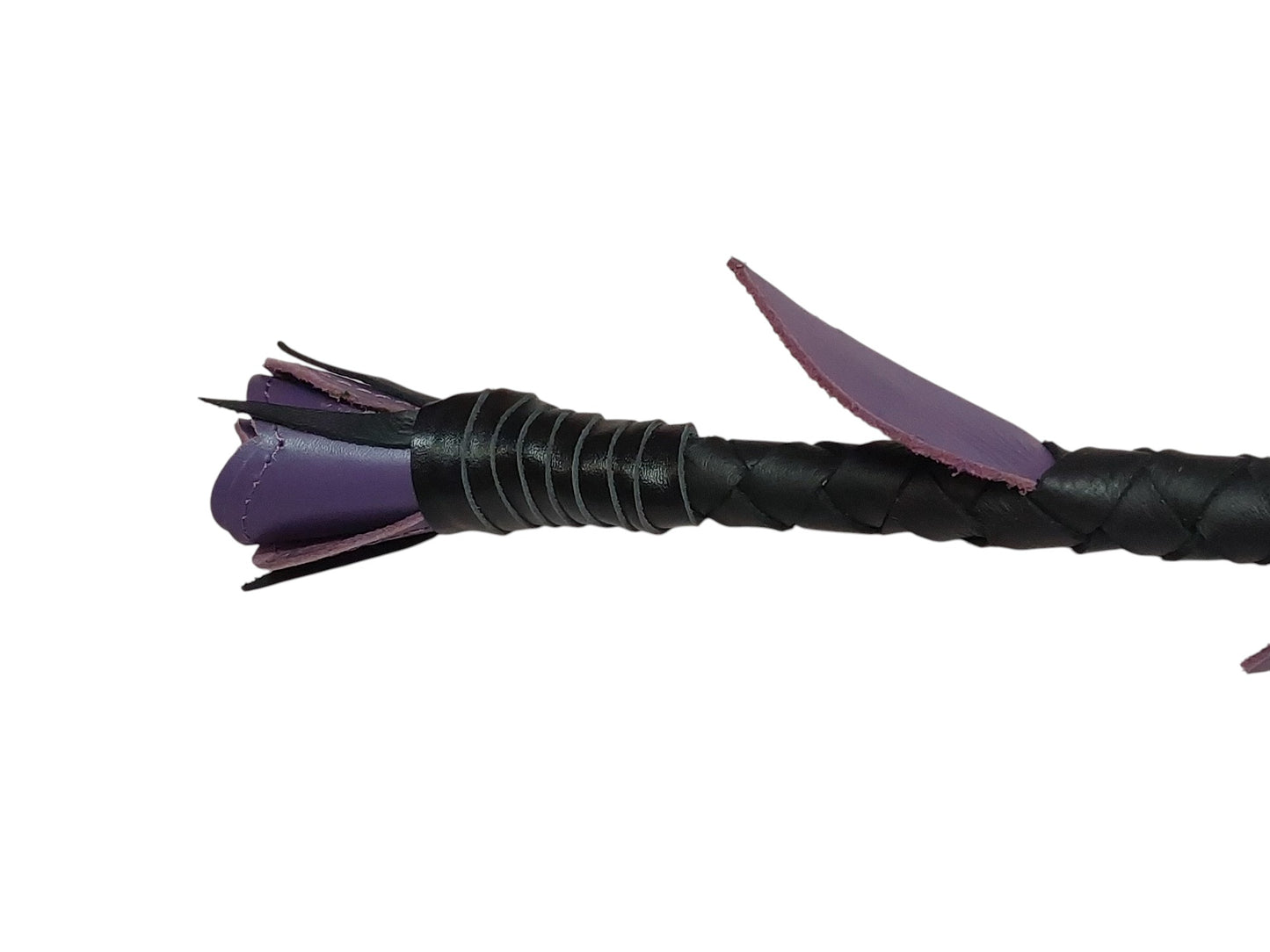 Luxury hand-made leather rose riding crop with purple stem & black rose tip. Fiberglass core, 680 mm length. Perfect for BDSM play.