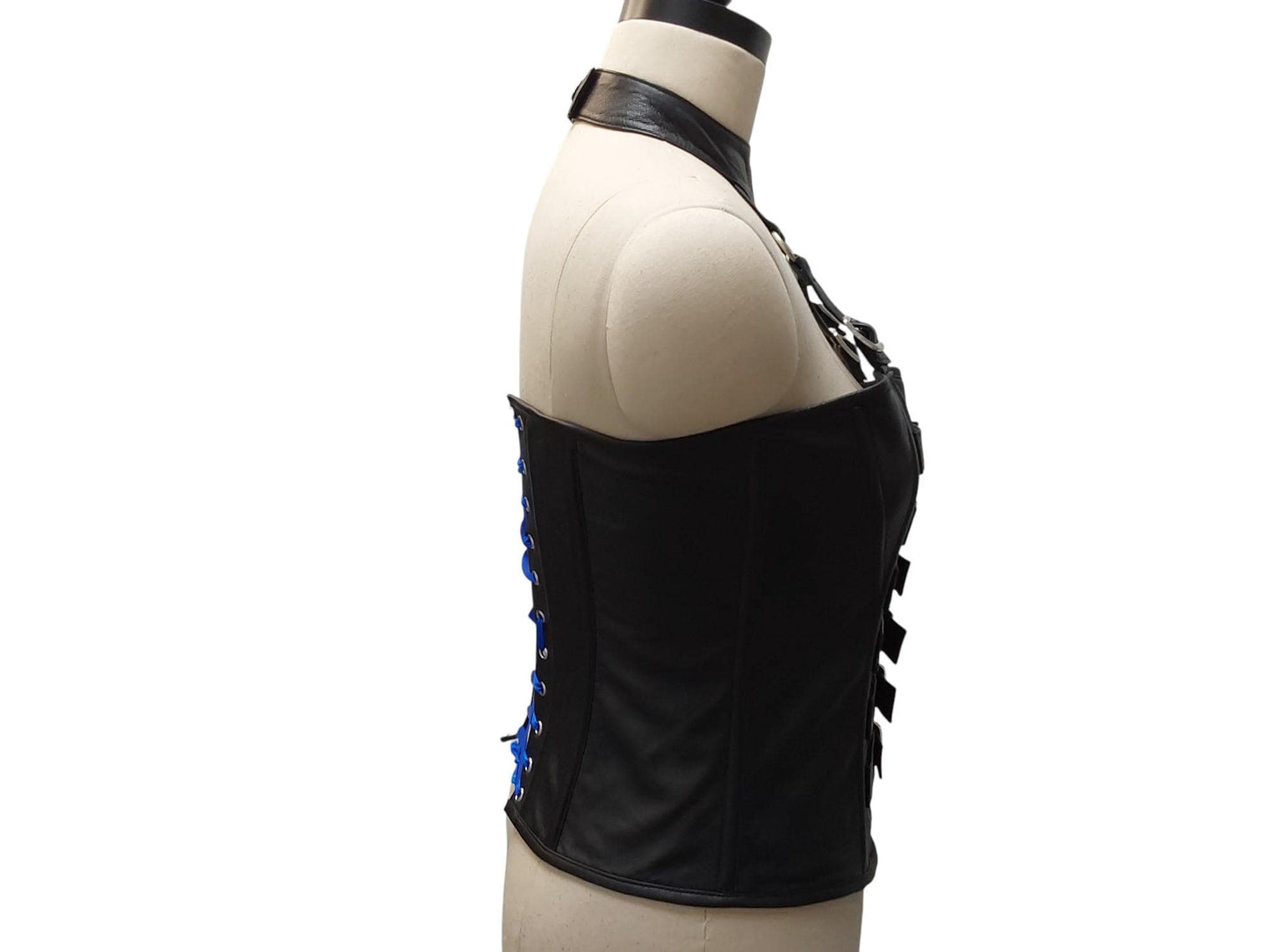 Andarta Hand-made black leather corset, bold buckle front, adjustable neck collar & lace-up back. Inspired by the goddess Andarta—power meets allure