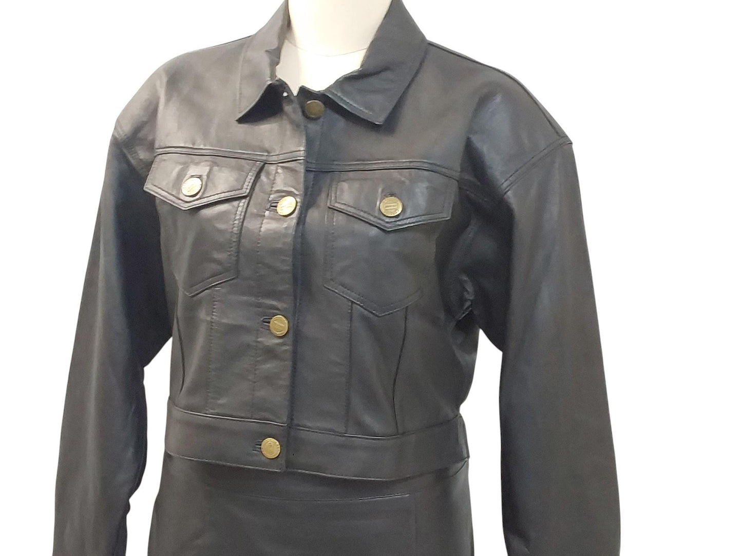 Handmade black lambskin leather jacket with brass buttons, lined for comfort, lightweight yet stylish—luxury artisan fashion built to last.