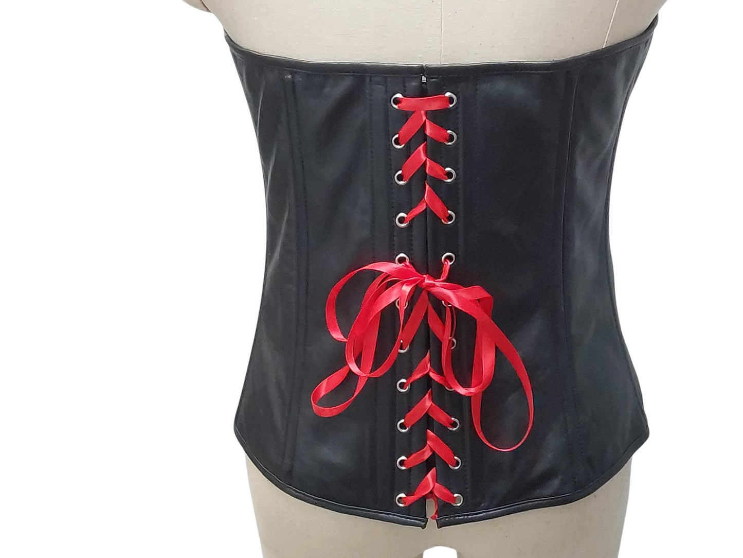 Bia—hand-crafted overbust leather corset with steel boning, full lining, and front busk. Power, structure, comfort. Black or custom colours.